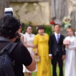 Photographe en train de photographier une cérémonie de mariage